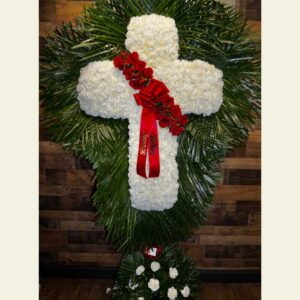 CR1000: White carnation cross with red rose break and palm leaf